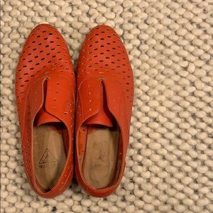 Red John Fluevog Slip-ons.